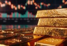 Goldbarren vor Kurstafel – Symbolbild für ETF-Zuflüsse und Rekordpreise auf dem Goldmarkt in Q2 2025