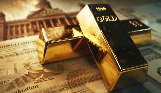 Goldbarren auf Diskussionspapier – Symbol für Goldneubewertung durch Staaten