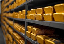 Goldbarren in Regalen, wie sie für Gold-ETFs wie den SPDR Gold Shares in London gelagert werden