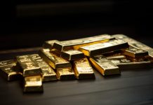 Gold ein großes Missverständnis? Rekordpreise, aber kaum Anleger investiert Gestapelte Goldbarren als Symbol für physisches Gold und Vermögensschutz