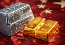 Goldpreis in China unter Europa-Kurs – Silber liefert starke Impulse Gold- und Silberbarren vor rotem Hintergrund – Goldpreis in China unter Europa-Kurs