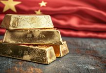 Goldbarren vor chinesischer Flagge – Goldpreis in China unter Europa-Kurs