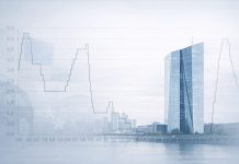 EZB-Zentrale in Frankfurt mit angedeutetem Zinschart – Leitzinsen bleiben unverändert